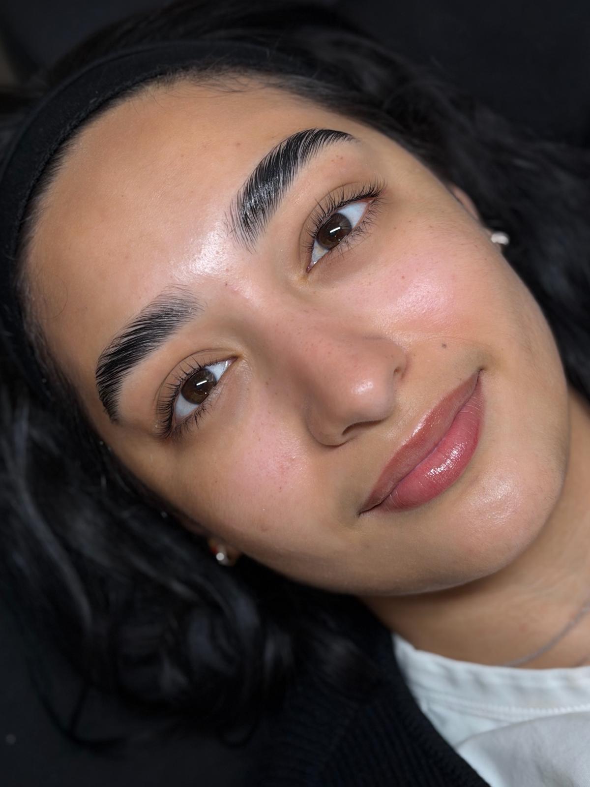 Brow Design at Studio Di Maria — Laminated and tinted brows with a lifted lash line.